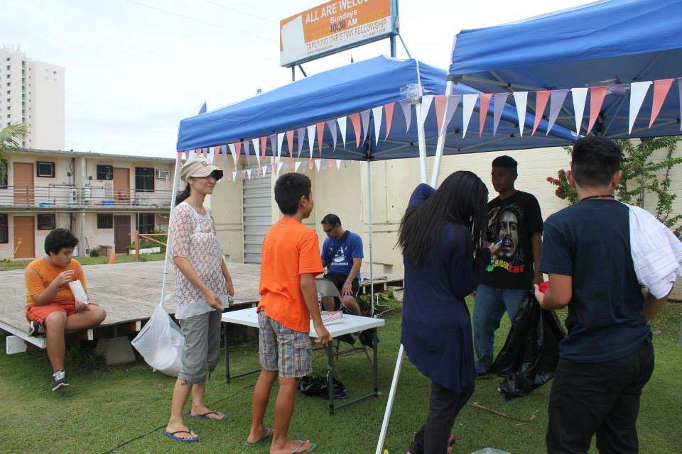 Fellowship members engaged in community worship